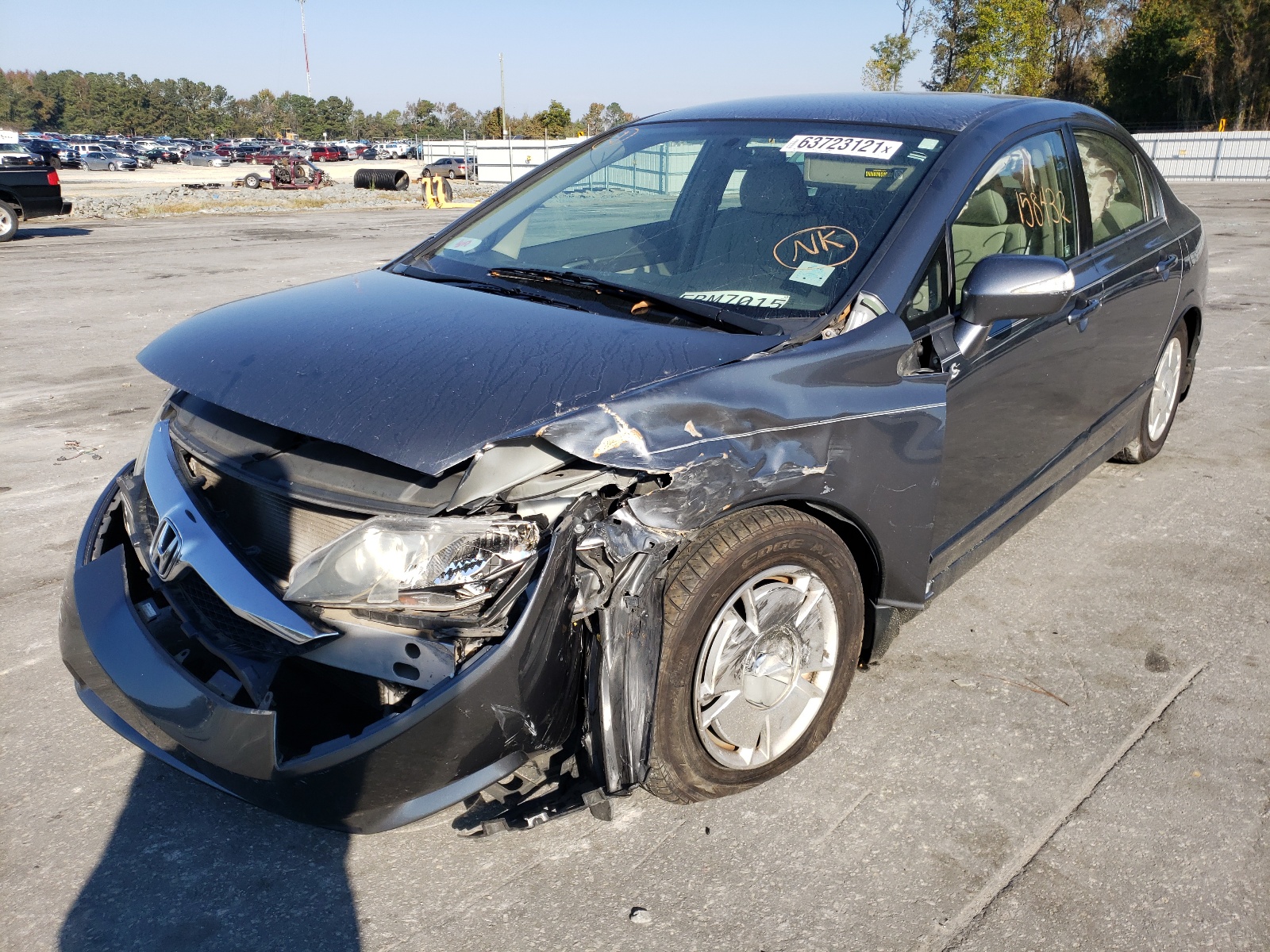 Photo 2 from auction – 2009 HONDA CIVIC HYBR with VIN JHMFA36249S001928