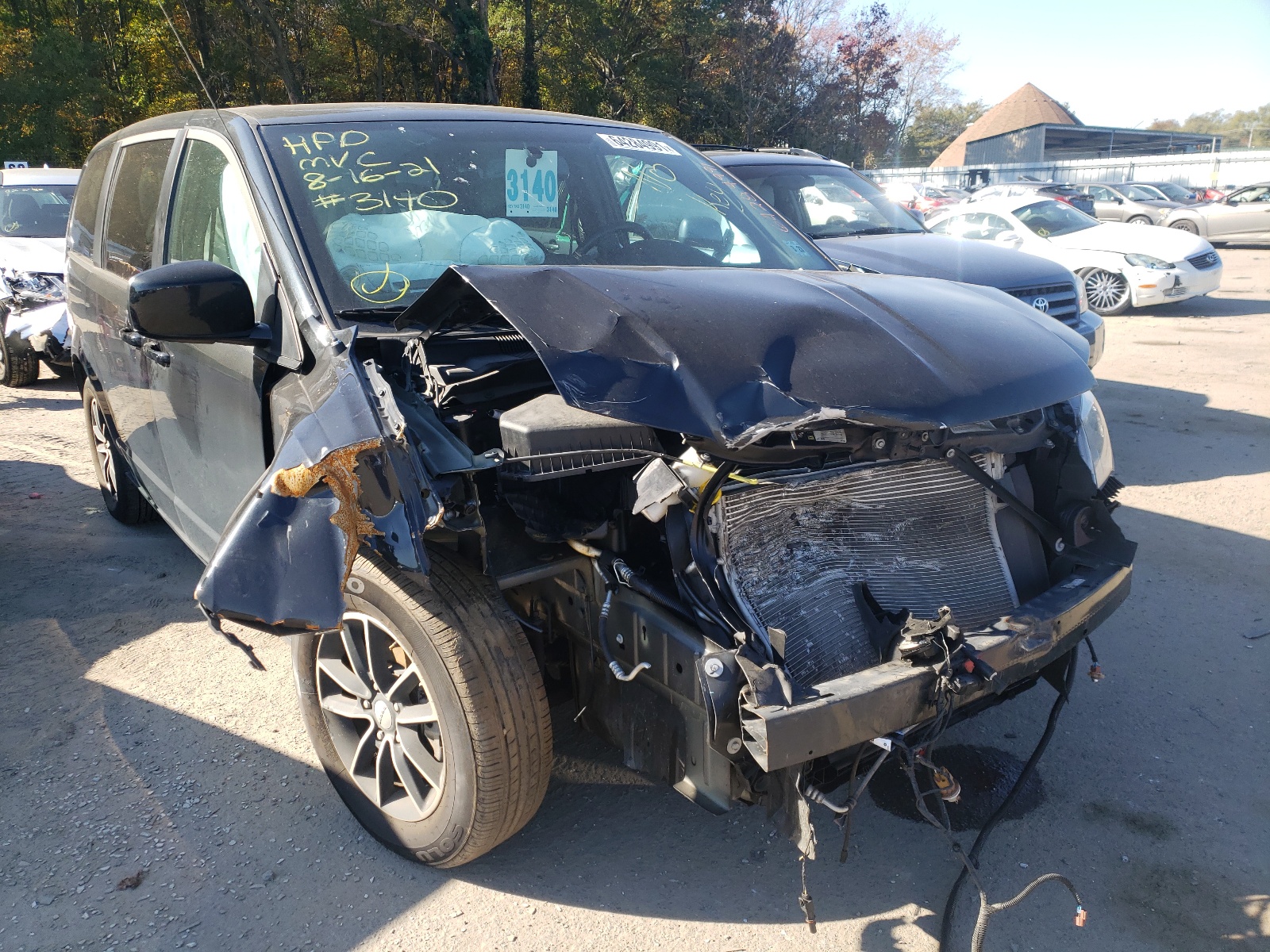 DODGE GRAND CARA 2018 with VIN 2C4RDGBG9JR254957 - Photo from auction