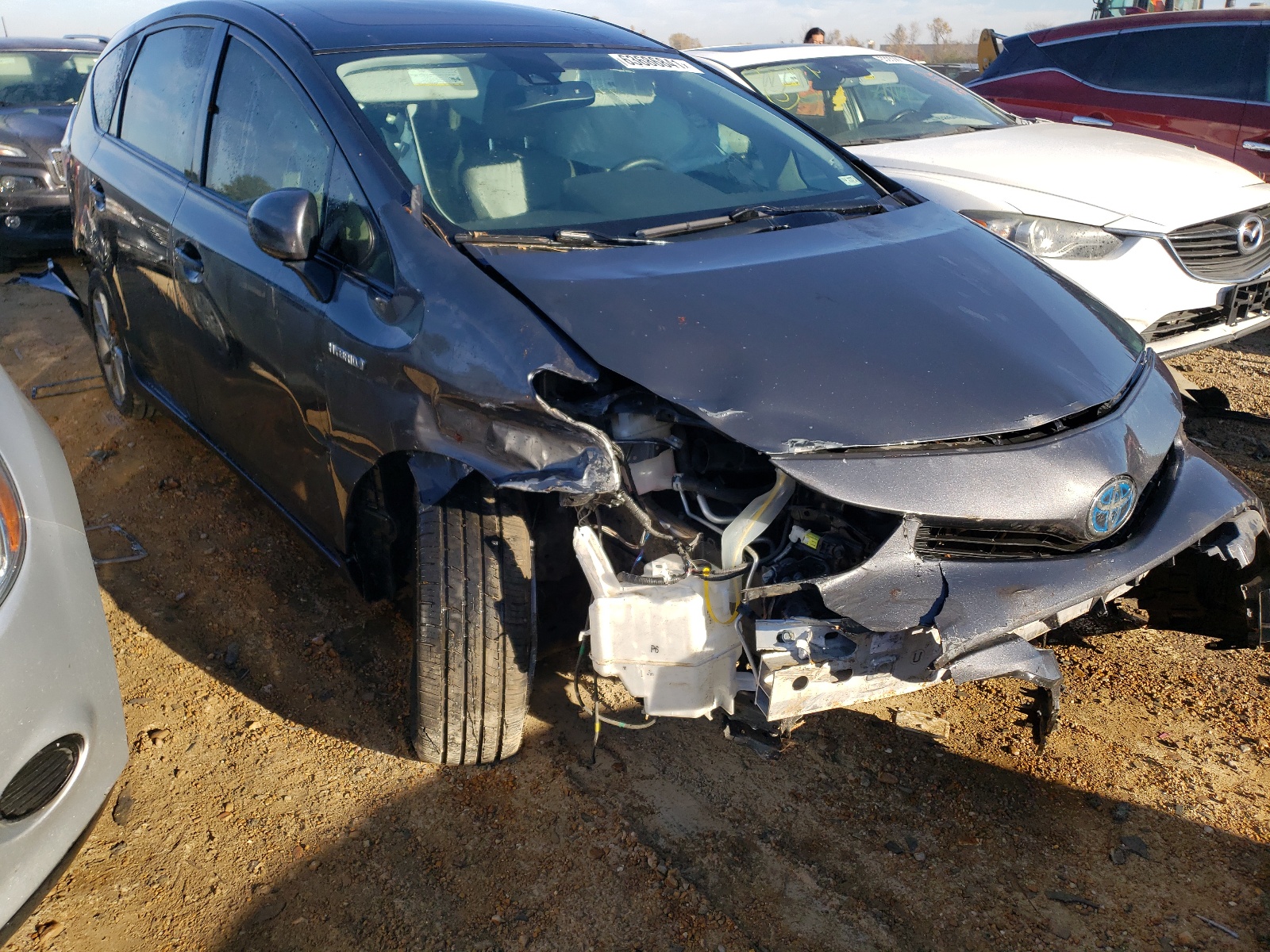 TOYOTA PRIUS V 2015 with VIN JTDZN3EU2FJ022347 - Photo from auction