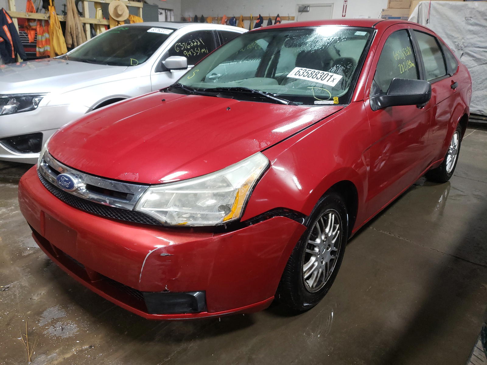 Photo 2 from auction – 2011 FORD FOCUS SE with VIN 1FAHP3FN8BW141553
