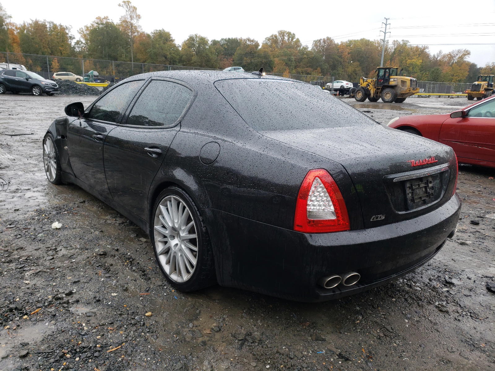 Photo 3 from auction – 2012 MASERATI QUATTROPOR with VIN ZAM39JKAXC0065663