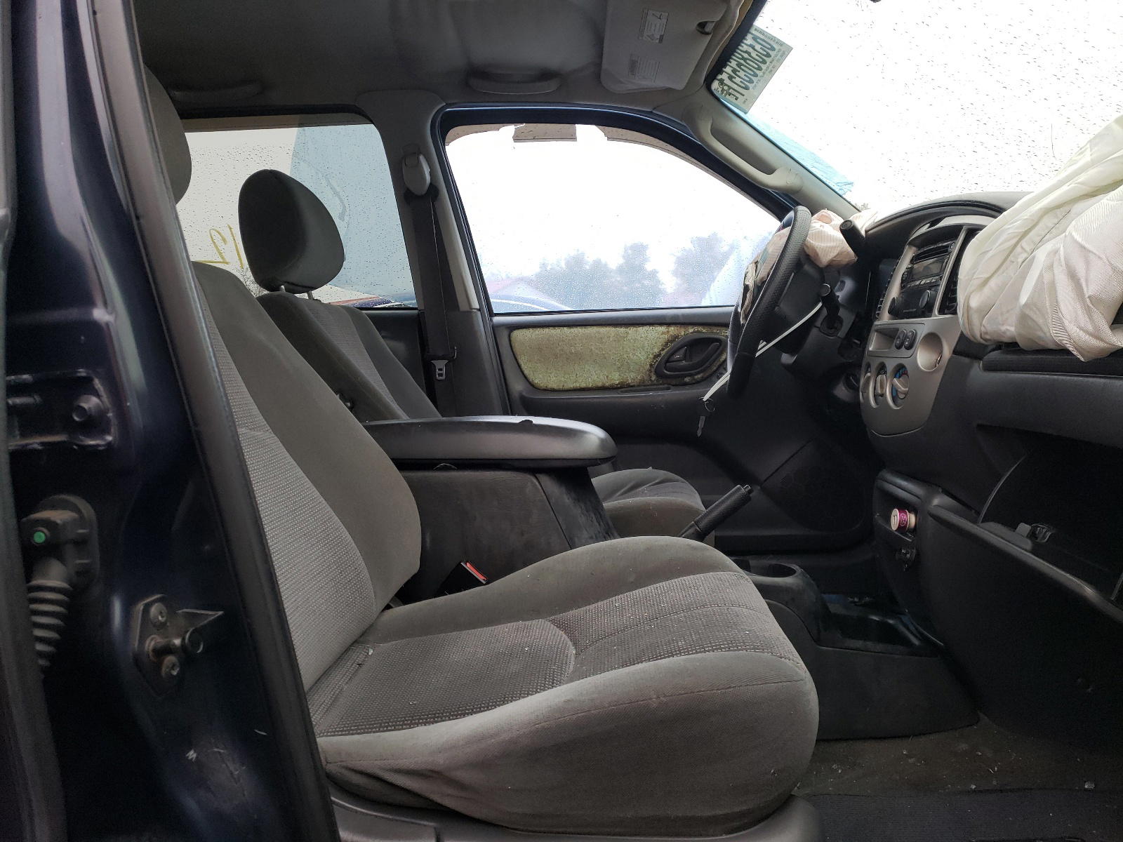 Photo 5 from auction – 2004 MAZDA TRIBUTE LX with VIN 4F2YZ94174KM13477