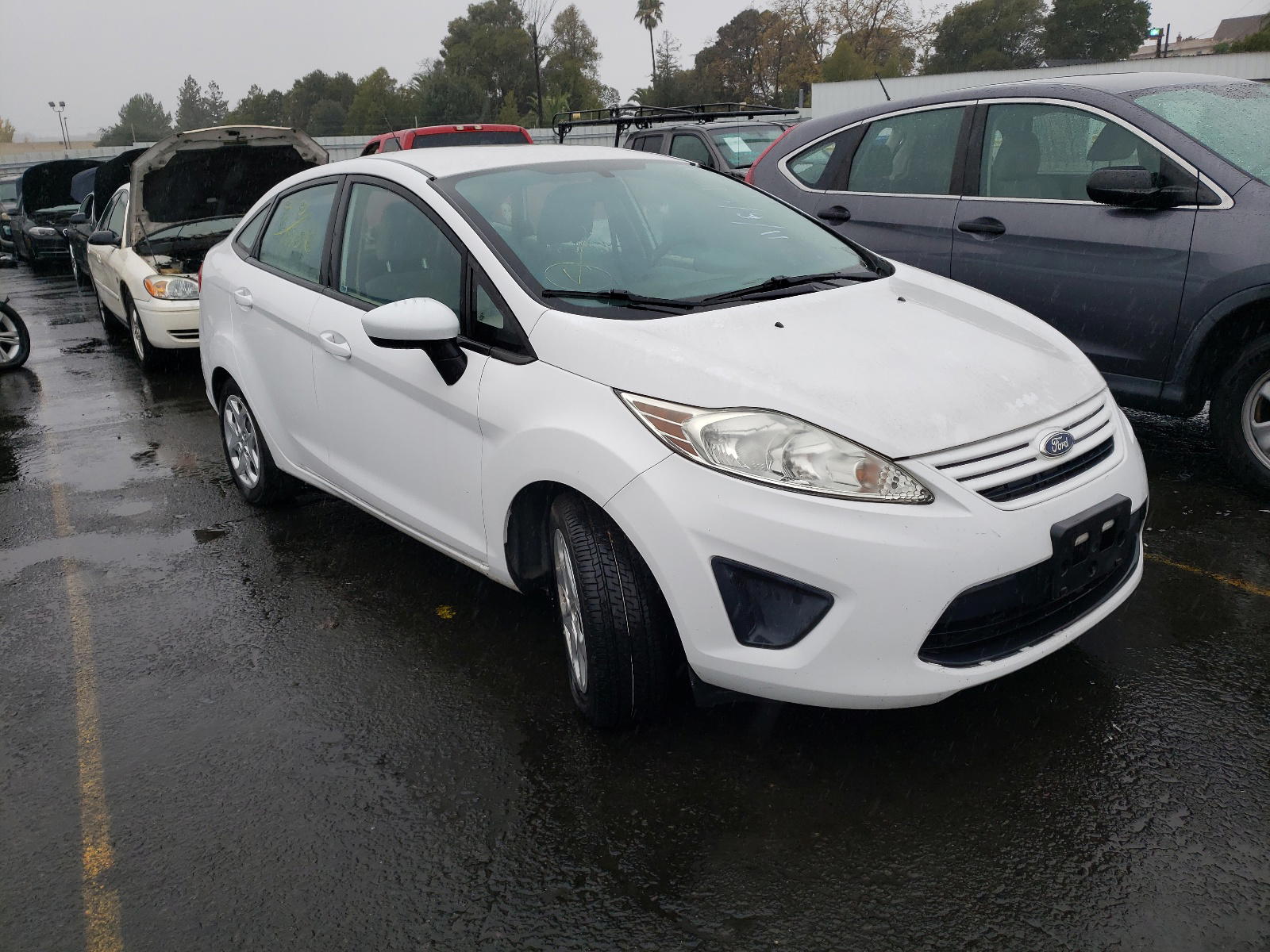 FORD FIESTA 2012 with VIN 3FADP4AJ8CM137982 - Photo from auction