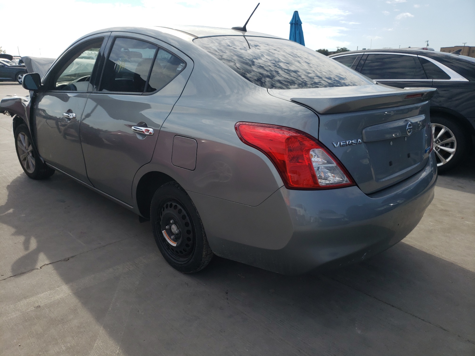 Photo 3 from auction – 2014 NISSAN VERSA S with VIN 3N1CN7APXEL852081