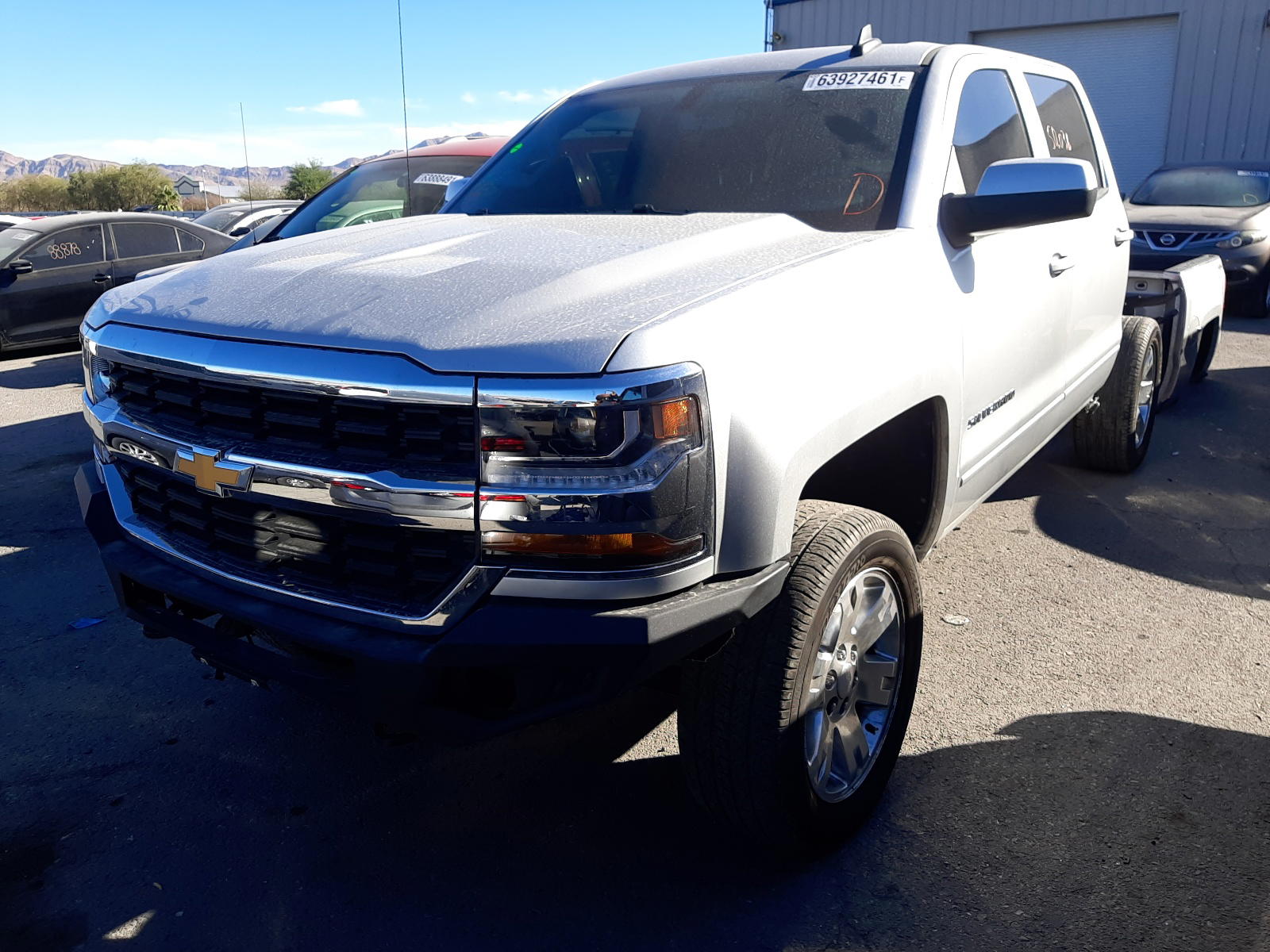 Photo 2 from auction – 2018 CHEVROLET SILVERADO with VIN 3GCUKREC9JG464002