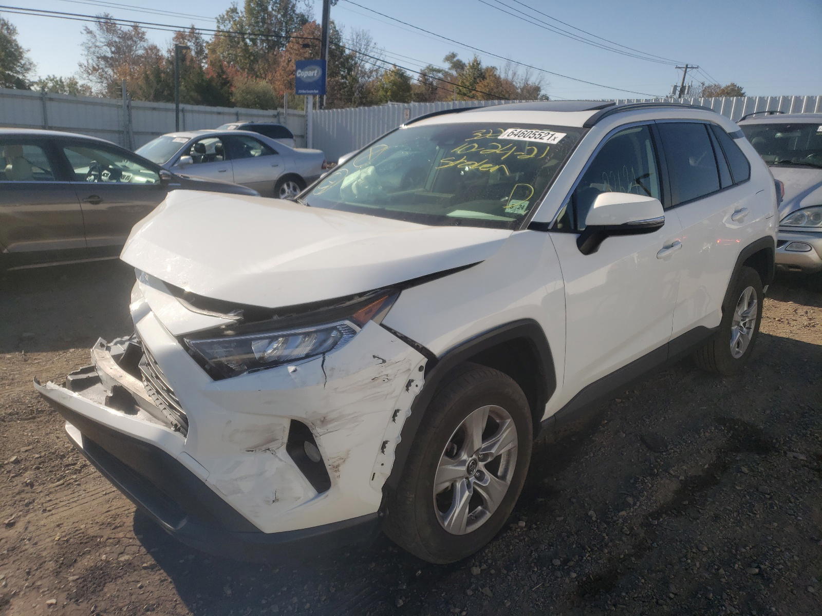 Photo 2 from auction – 2019 TOYOTA RAV4 XLE with VIN JTMP1RFV0KD016164
