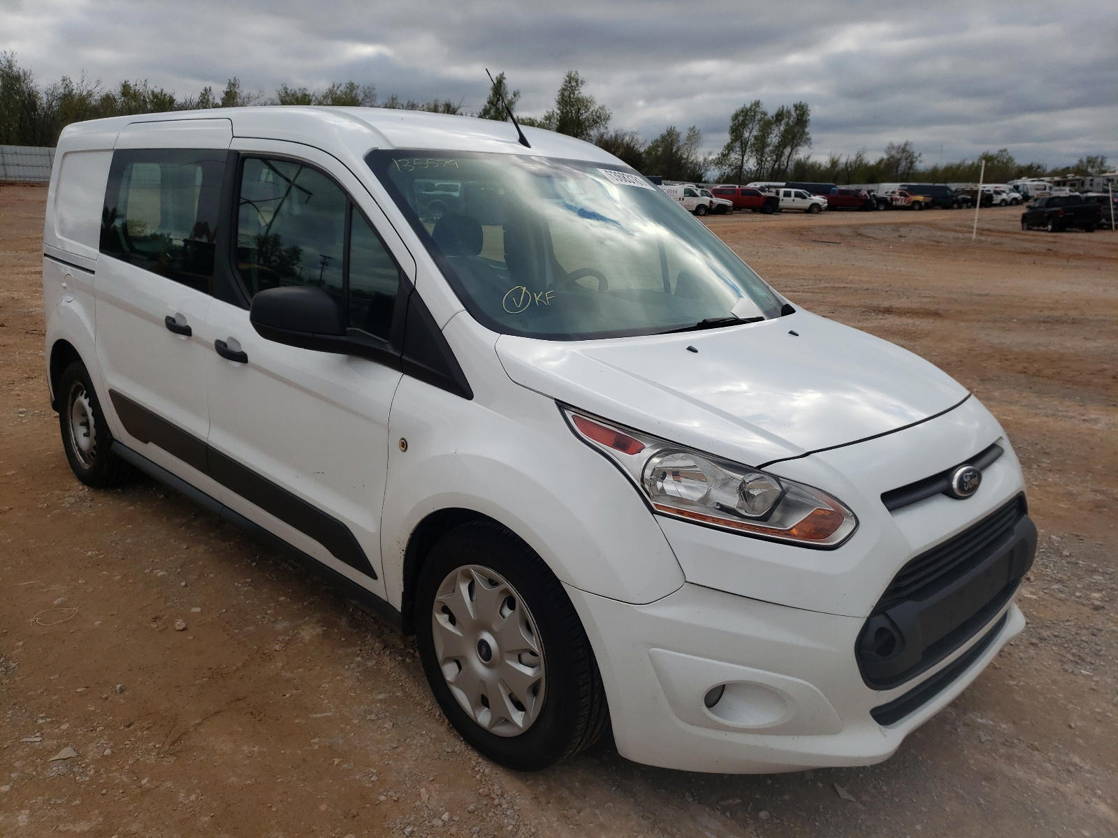 FORD TRANSIT CO 2014 with VIN NM0LS7F74E1135579 - Photo from auction