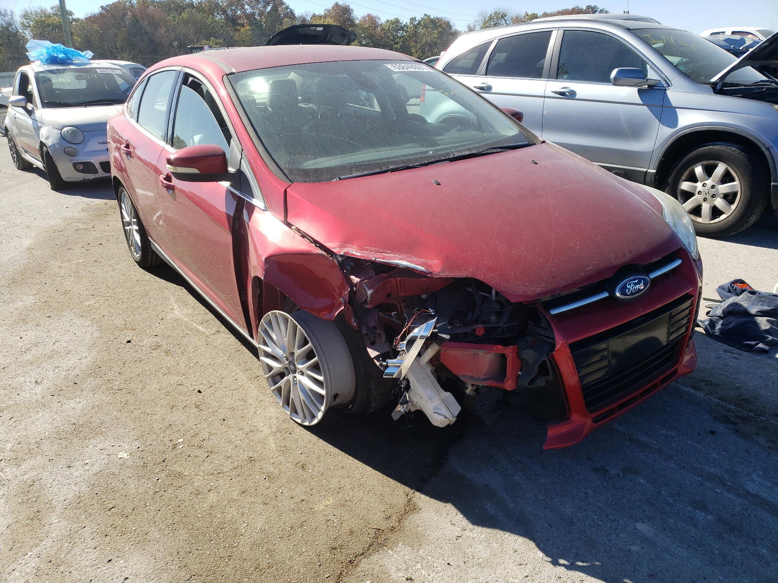 FORD FOCUS 2012 with VIN 1FAHP3H21CL104740 - Photo from auction