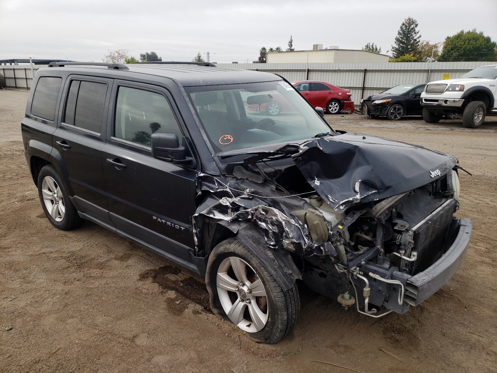 Photo 1 from auction – 2014 JEEP PATRIOT SP with VIN 1C4NJPBB6ED560955
