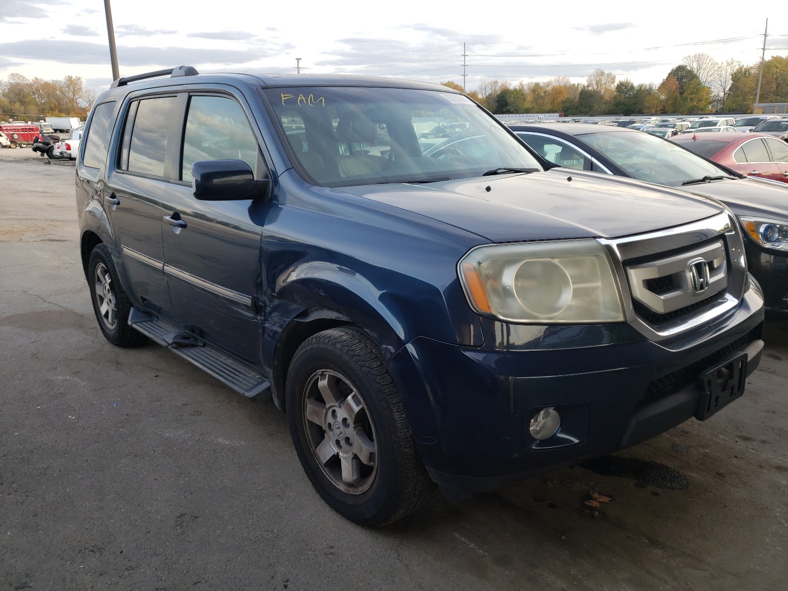 HONDA PILOT TOUR 2010 with VIN 5FNYF4H90AB003642 - Photo from auction