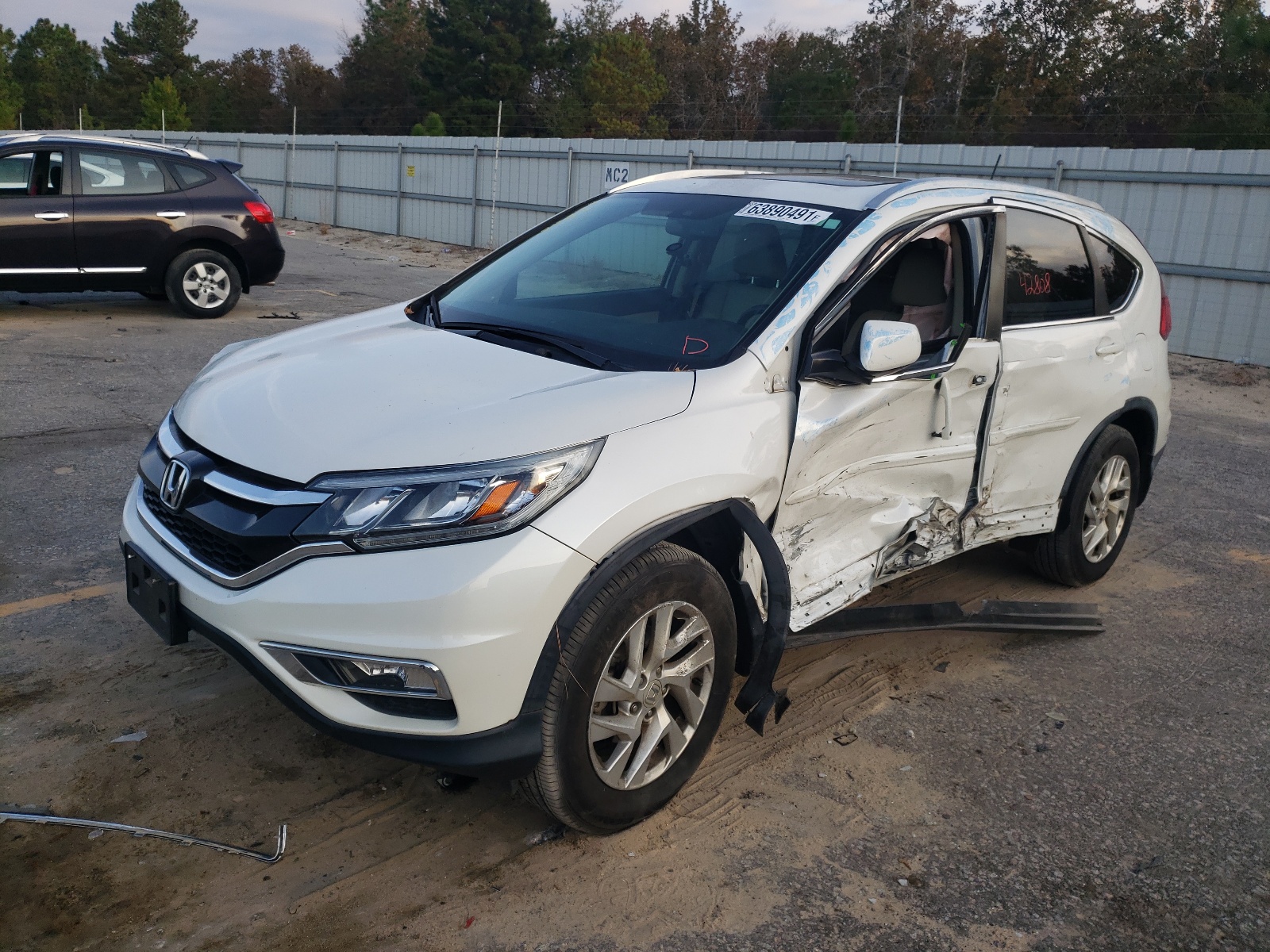 Photo 2 from auction – 2016 HONDA CR-V EXL with VIN 5J6RM4H70GL135258