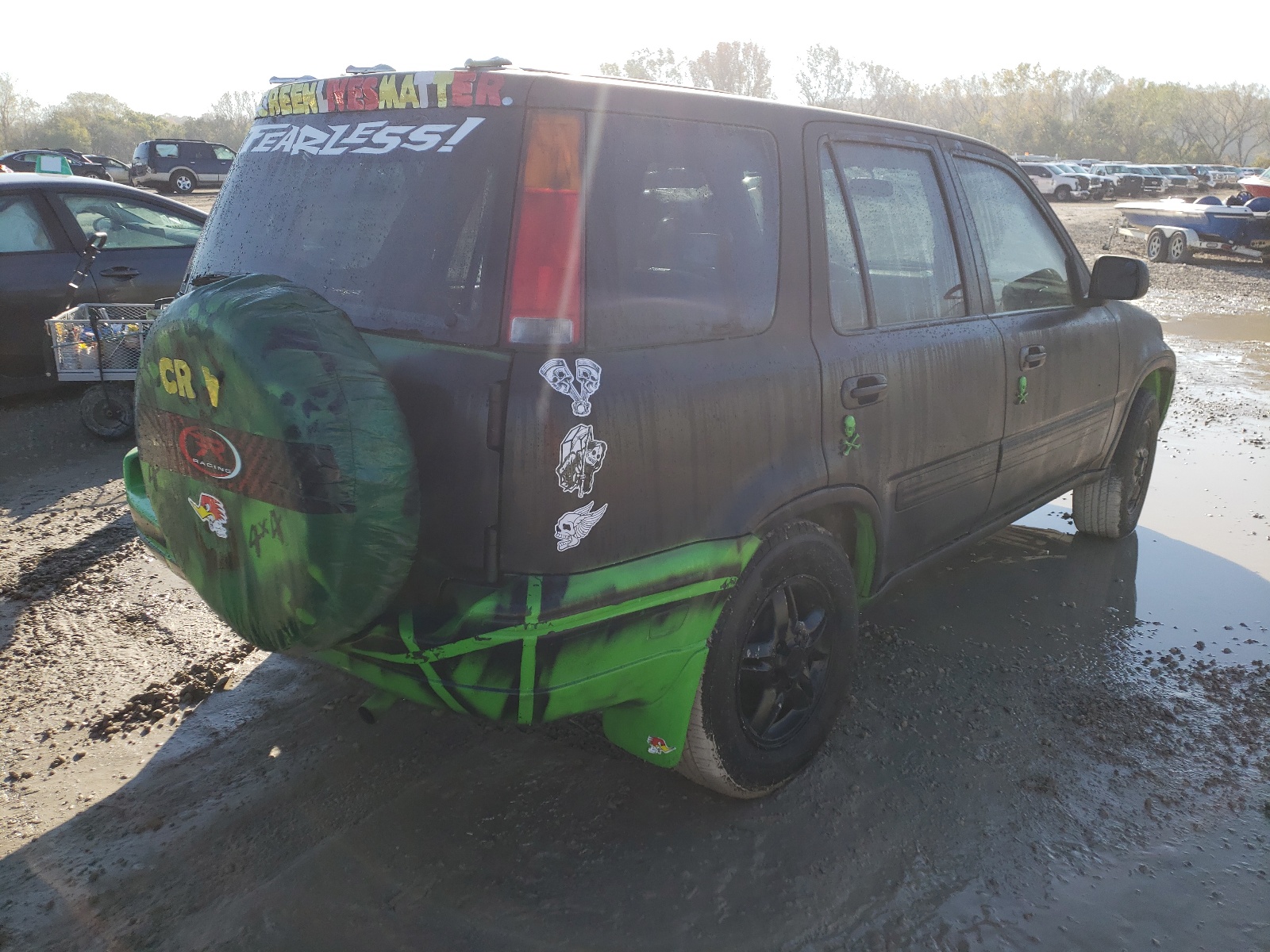 Photo 4 from auction – 1999 HONDA CR-V EX with VIN JHLRD1863XC075099