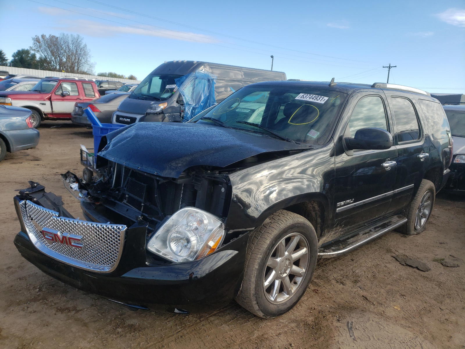 Photo 2 from auction – 2011 GMC YUKON DENA with VIN 1GKS2EEFXBR388239