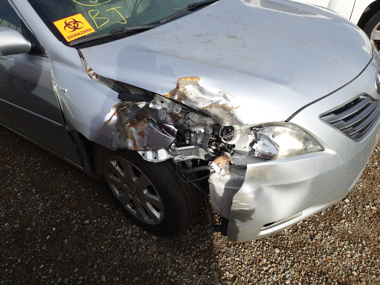 Photo 9 from auction – 2007 TOYOTA CAMRY HYBR with VIN JTNBB46K973022618