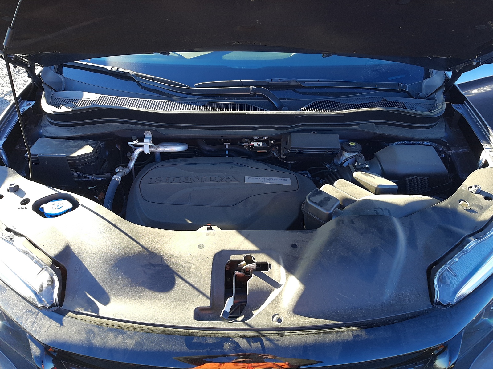Photo 7 from auction – 2020 HONDA PASSPORT E with VIN 5FNYF7H54LB003984