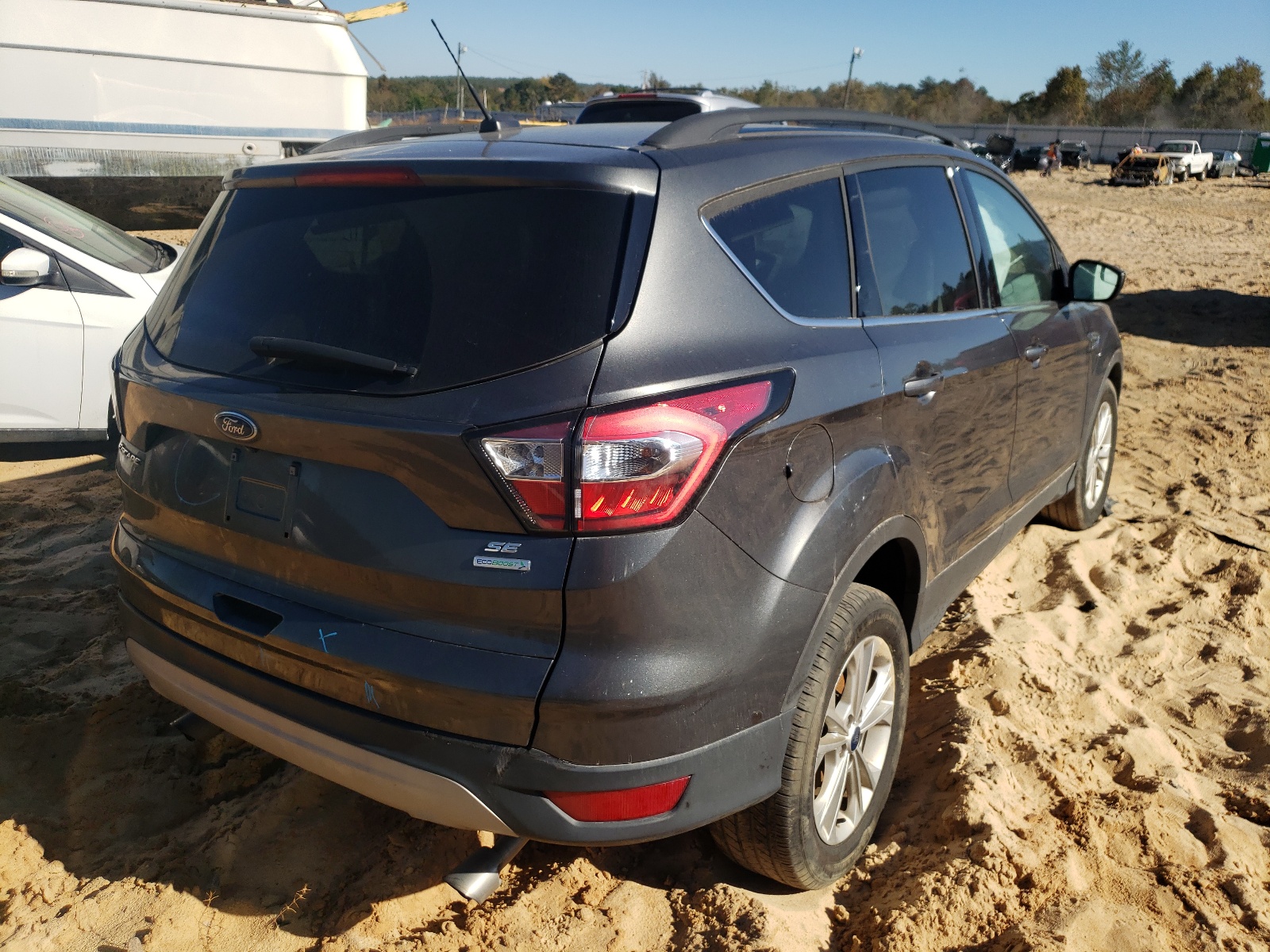 Photo 4 from auction – 2018 FORD ESCAPE SE with VIN 1FMCU0GD0JUD48526