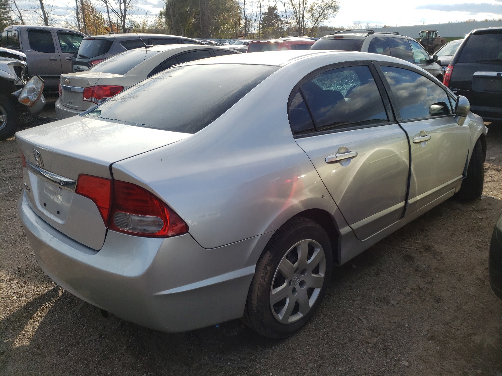 Photo 4 from auction – 2010 HONDA CIVIC LX with VIN 19XFA1F52AE043859