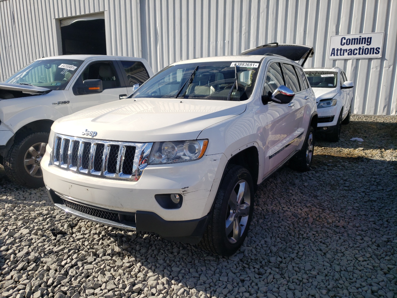 Photo 2 from auction – 2011 JEEP GRAND CHER with VIN 1J4RR6GT4BC560230