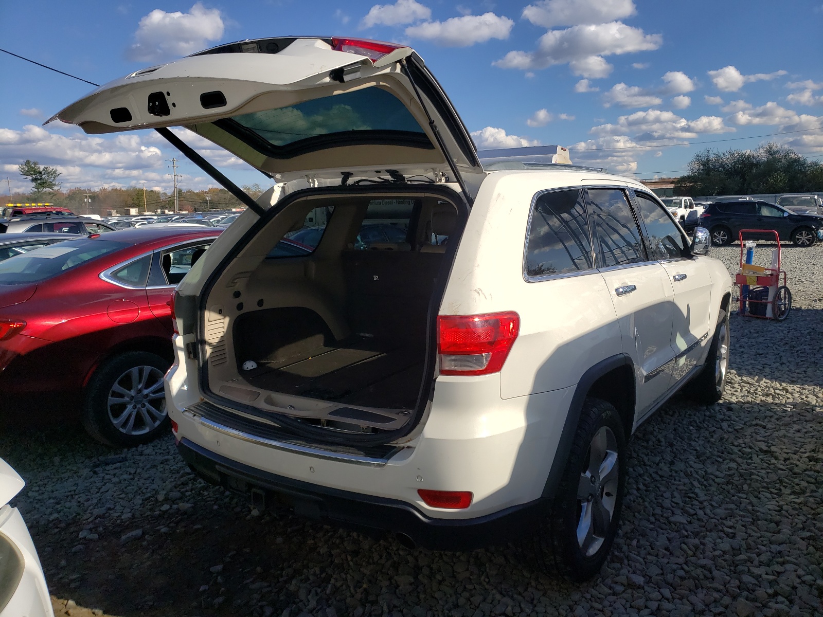 Photo 4 from auction – 2011 JEEP GRAND CHER with VIN 1J4RR6GT4BC560230