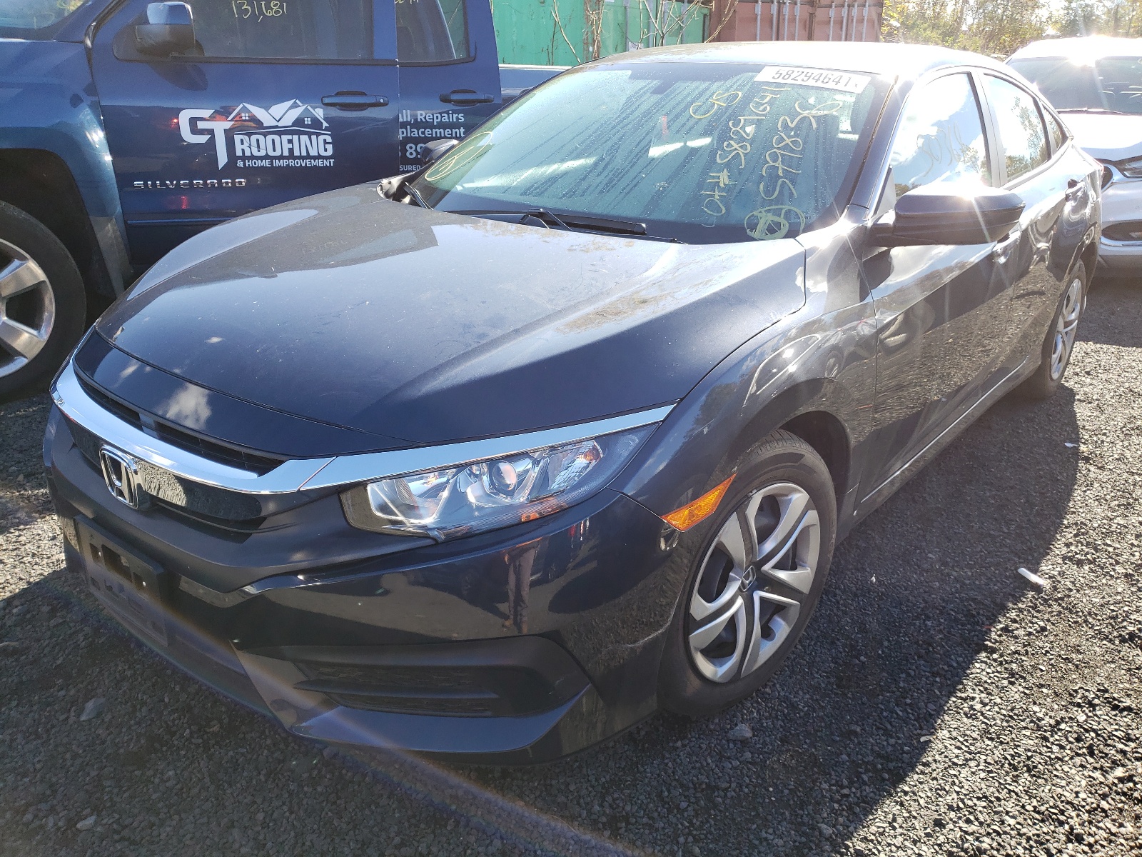 Photo 2 from auction – 2018 HONDA CIVIC LX with VIN 2HGFC2F5XJH579836