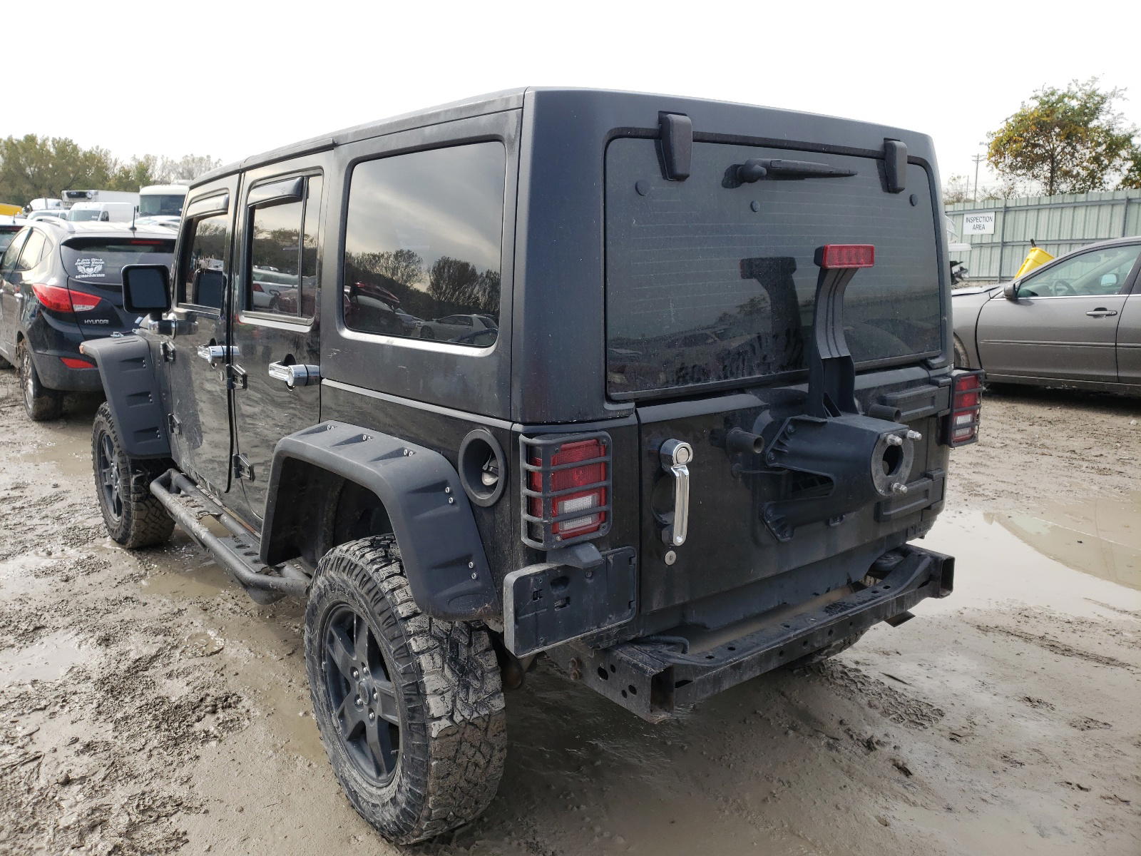 Photo 3 from auction – 2011 JEEP WRANGLER U with VIN 1J4BA3H18BL522021