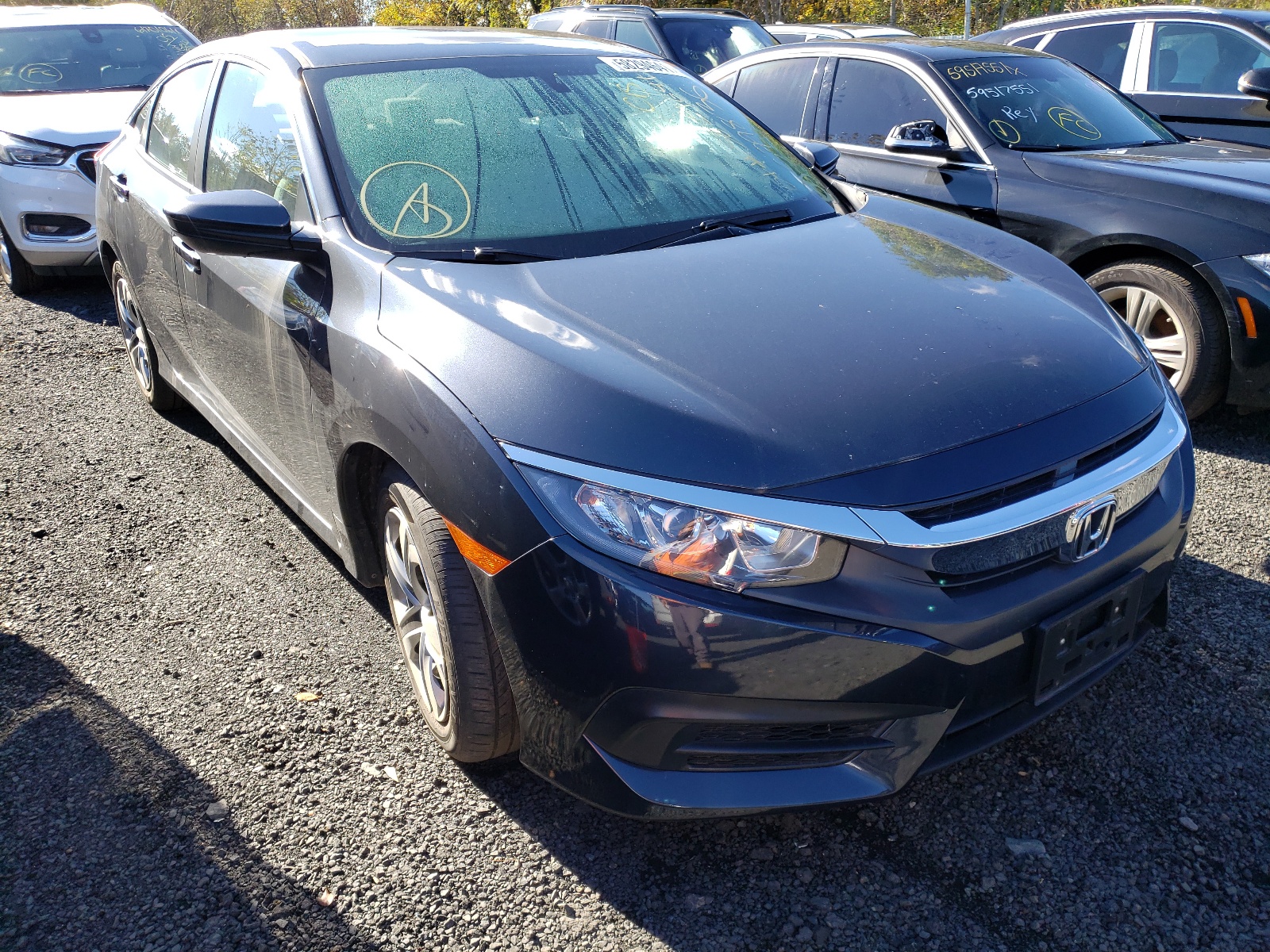 Photo 1 from auction – 2018 HONDA CIVIC LX with VIN 2HGFC2F5XJH579836