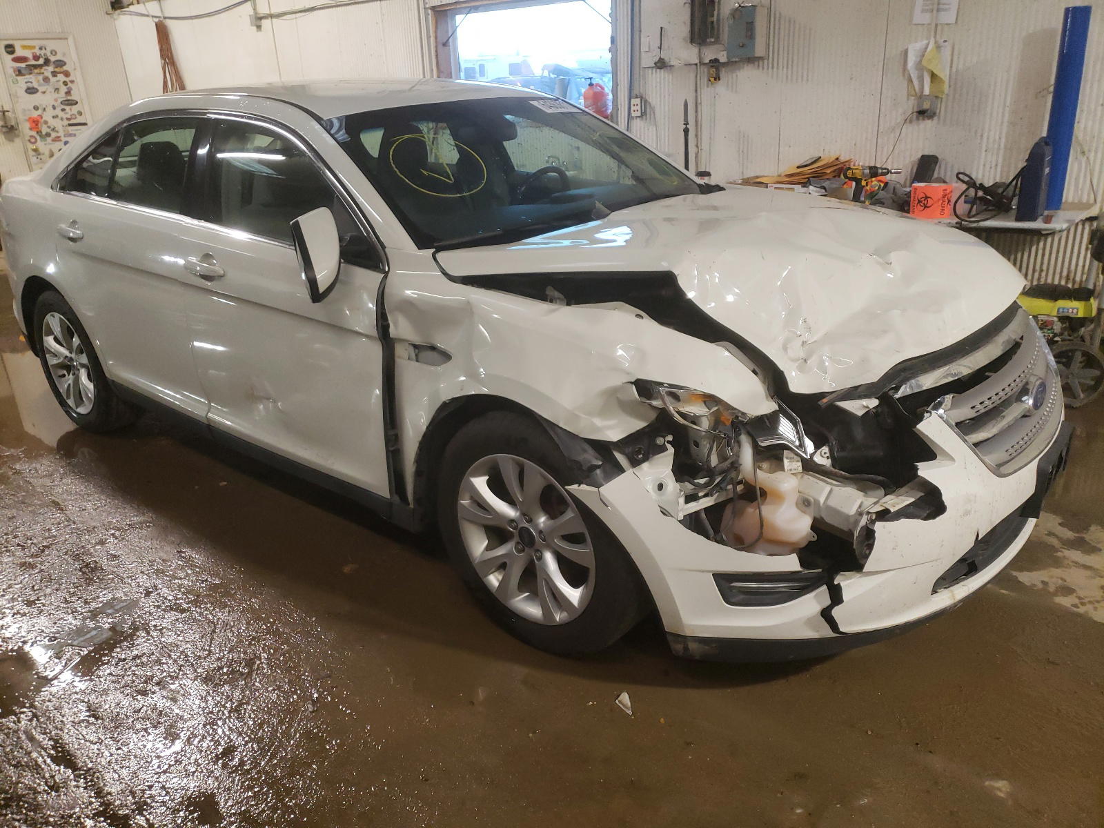 FORD TAURUS SEL 2012 with VIN 1FAHP2EWXCG102995 - Photo from auction