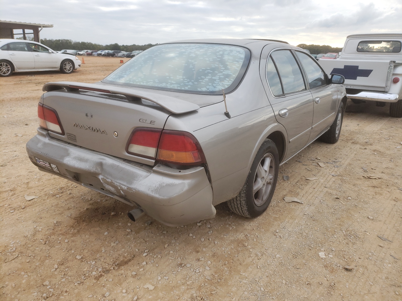Photo 4 from auction – 1999 NISSAN MAXIMA GLE with VIN JN1CA21A3XT106029