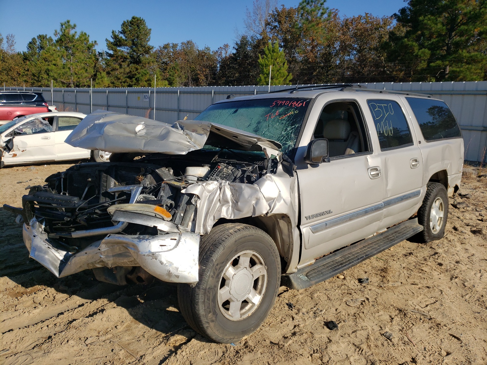 Photo 2 from auction – 2004 GMC YUKON with VIN 1GKFK16Z84J287169