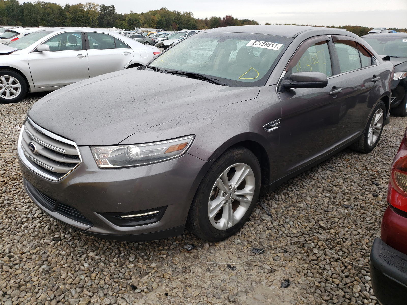 Photo 2 from auction – 2014 FORD TAURUS SEL with VIN 1FAHP2E89EG132977