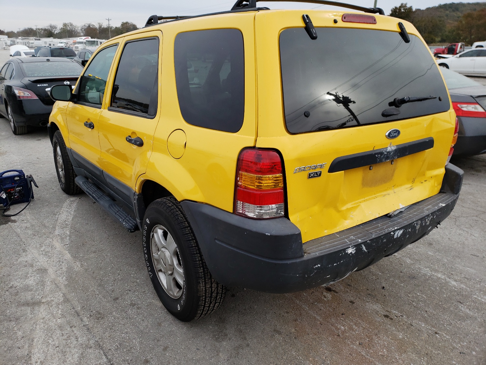 Photo 3 from auction – 2003 FORD ESCAPE XLT with VIN 1FMYU03103KA69321
