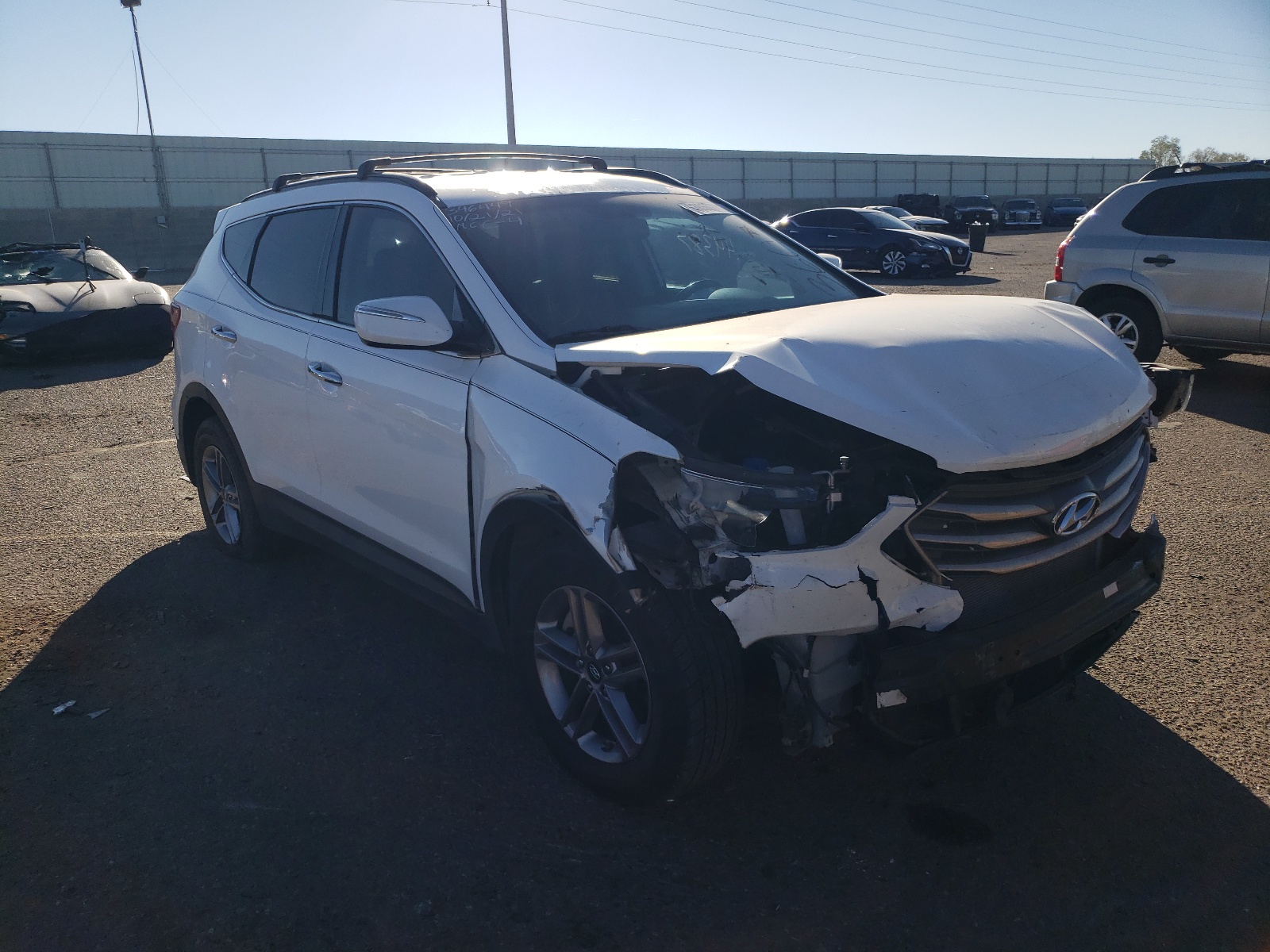 HYUNDAI SANTA FE S 2017 with VIN 5NMZU3LB1HH042053 - Photo from auction