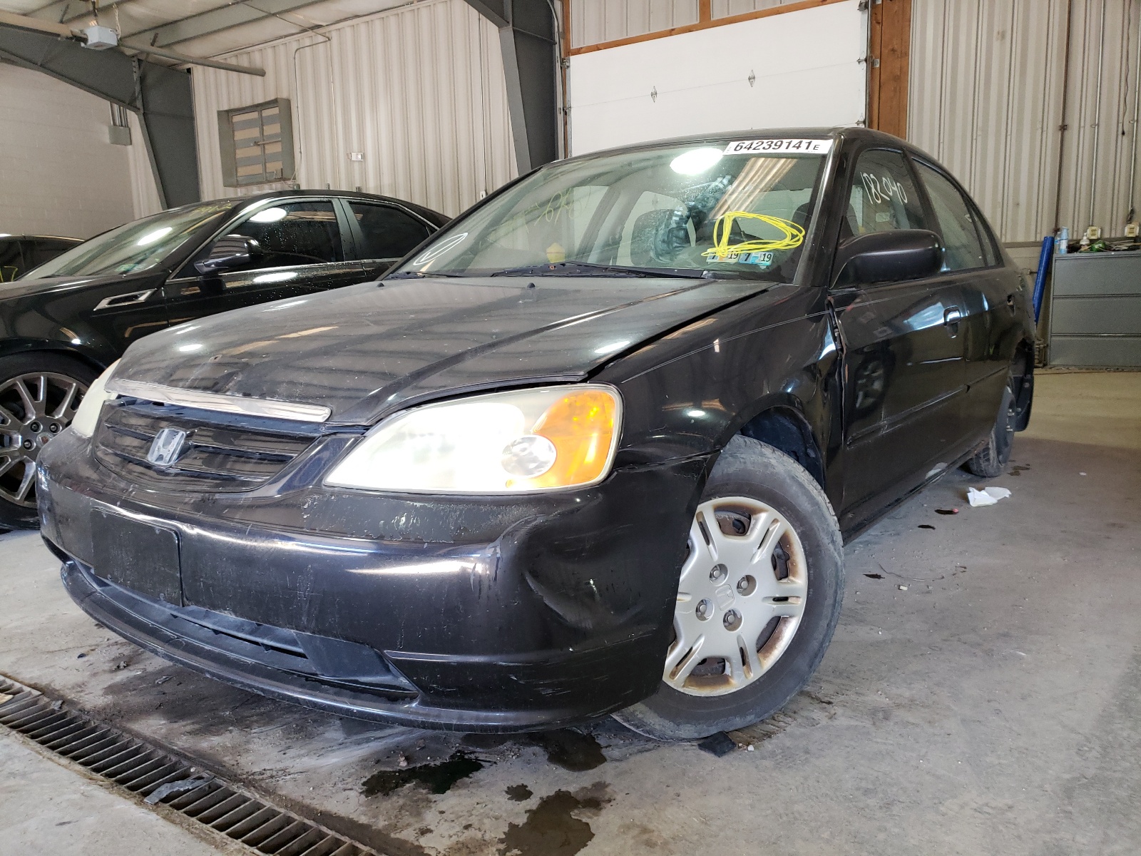 Photo 2 from auction – 2002 HONDA CIVIC LX with VIN 2HGES15562H581711