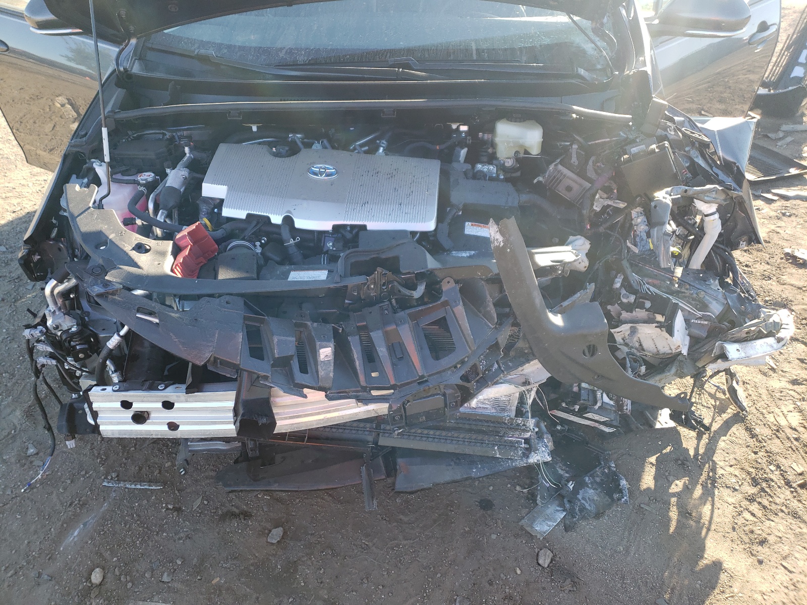Photo 7 from auction – 2021 TOYOTA PRIUS PRIM with VIN JTDKAMFP2M3189658