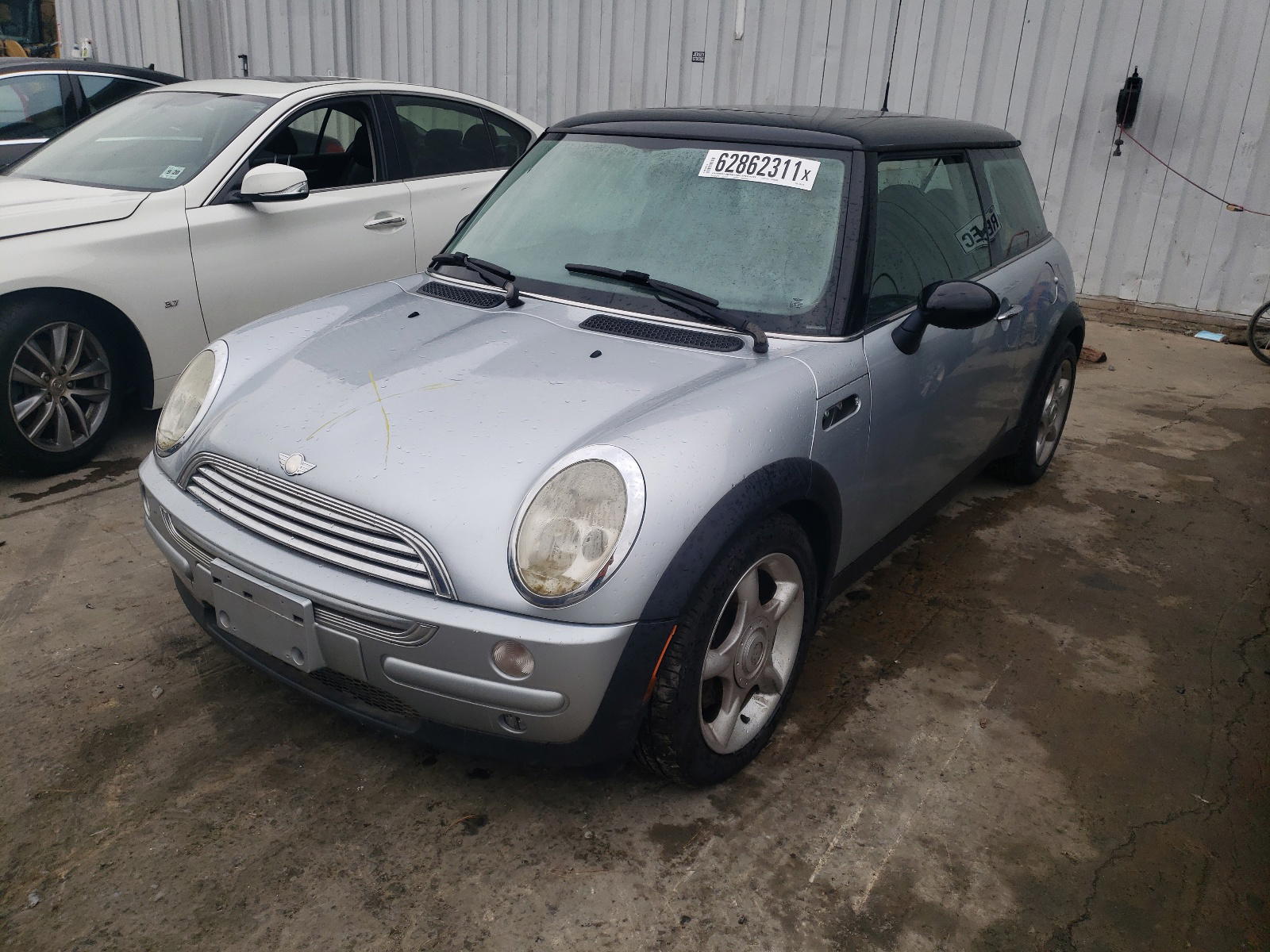 Photo 9 from auction – 2004 MINI COOPER with VIN WMWRC33454TJ56115