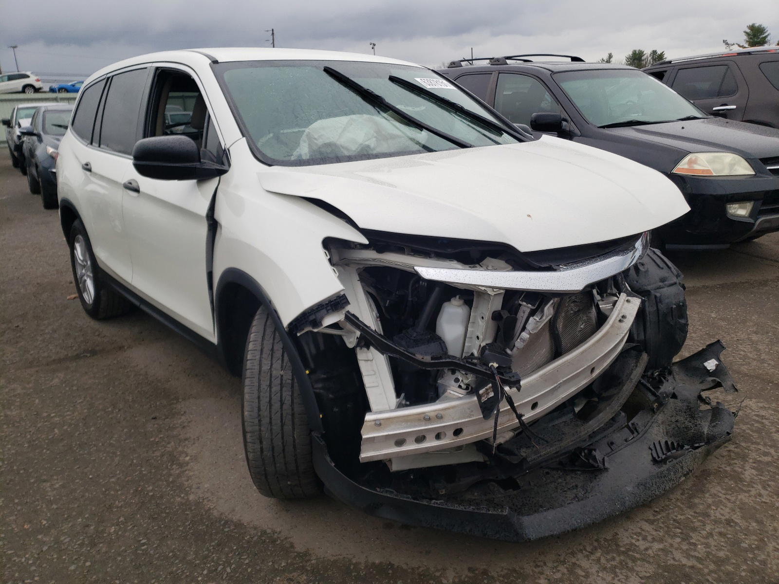 HONDA PILOT LX 2016 with VIN 5FNYF6H18GB090589 - Photo from auction