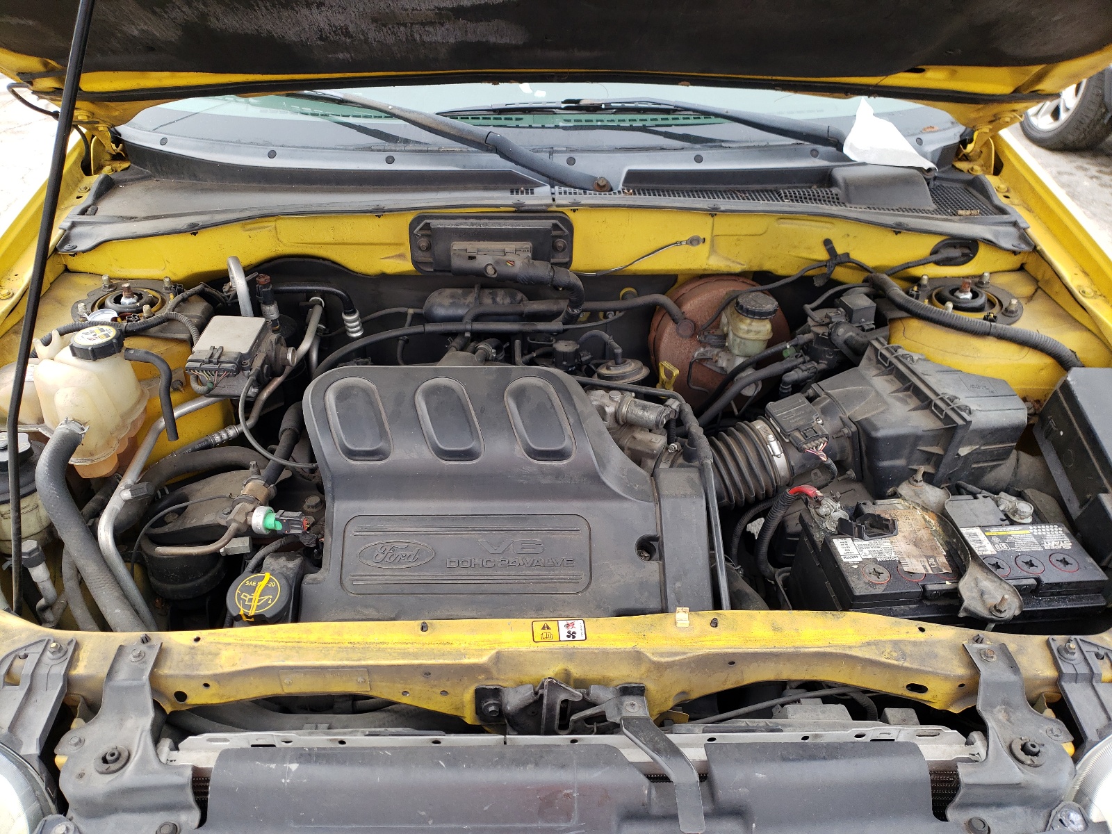 Photo 7 from auction – 2003 FORD ESCAPE XLT with VIN 1FMYU03103KA69321