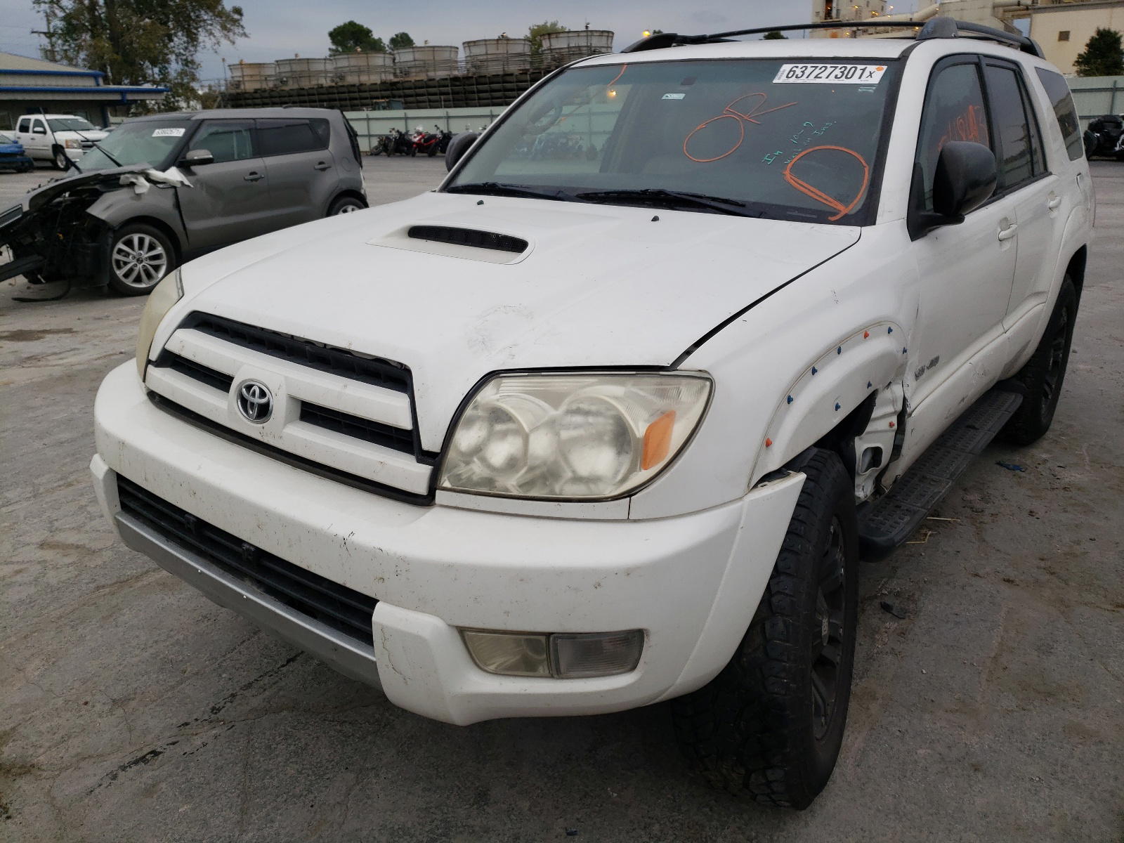 Photo 2 from auction – 2004 TOYOTA 4RUNNER SR with VIN JTEBU14R140021985