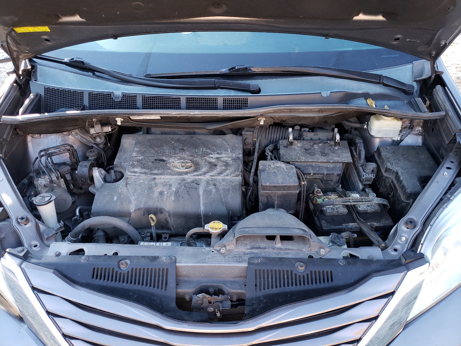 Photo 7 from auction – 2015 TOYOTA SIENNA LE with VIN 5TDKK3DC3FS559931