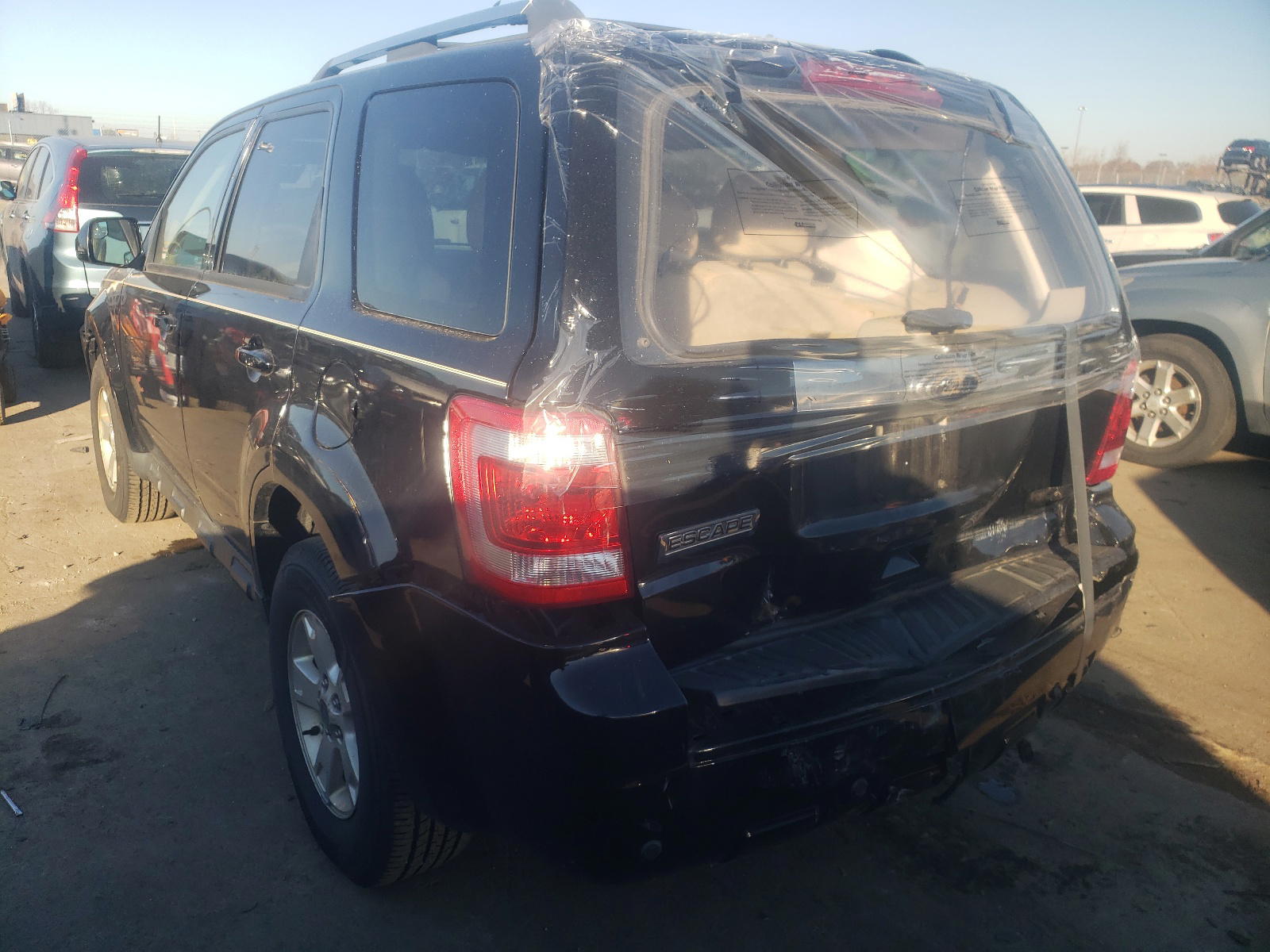Photo 3 from auction – 2012 FORD ESCAPE LIM with VIN 1FMCU0E79CKB29057