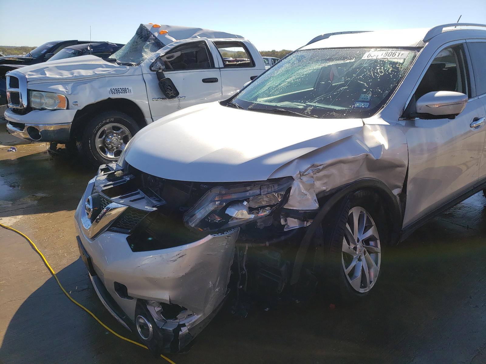 Photo 9 from auction – 2014 NISSAN ROGUE S with VIN 5N1AT2MVXEC750181