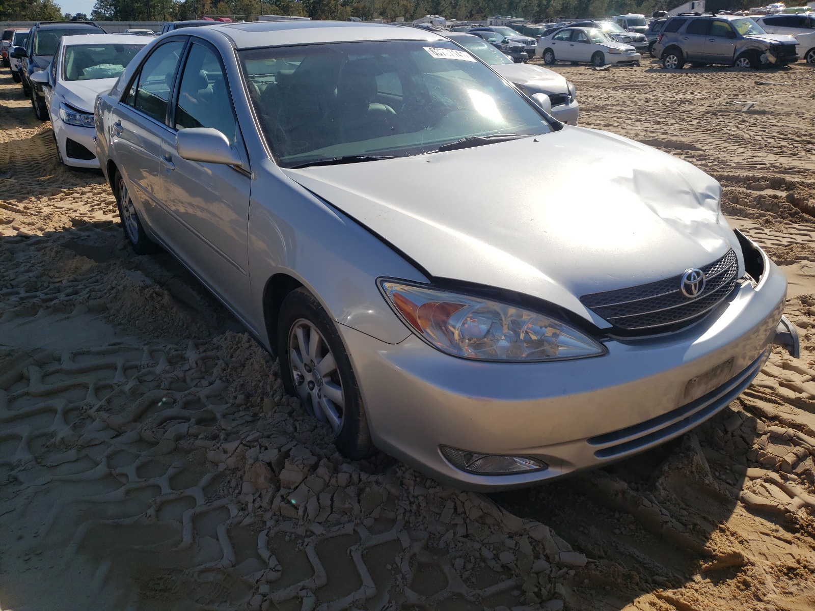 TOYOTA CAMRY LE 2003 with VIN 4T1BF32K53U554652 - Photo from auction