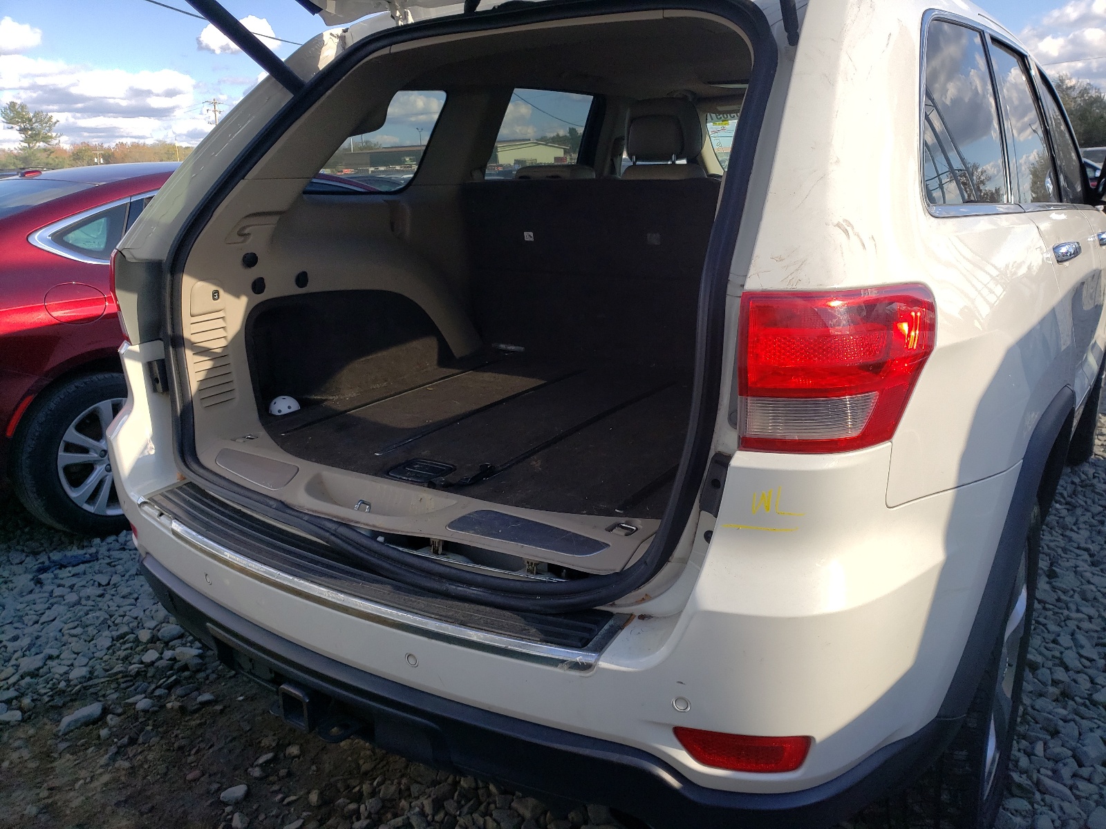 Photo 9 from auction – 2011 JEEP GRAND CHER with VIN 1J4RR6GT4BC560230