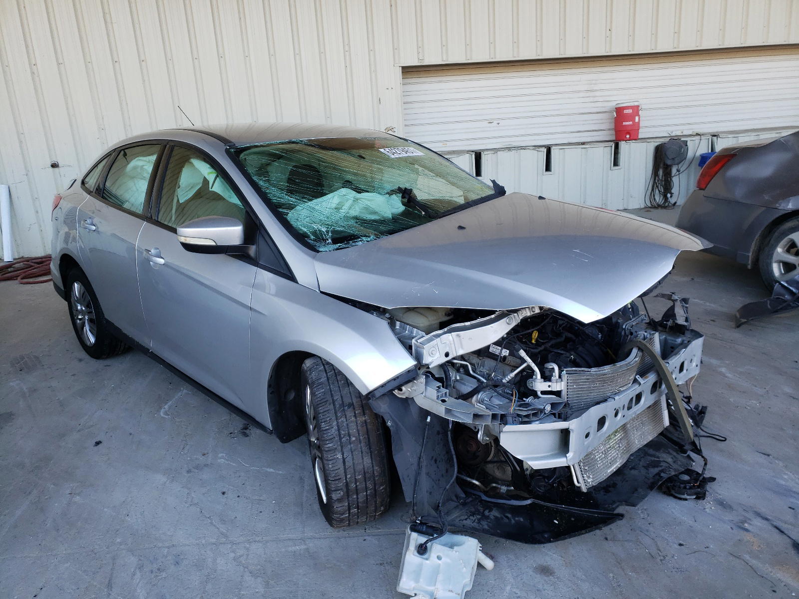 FORD FOCUS SE 2014 with VIN 1FADP3F27EL376519 - Photo from auction
