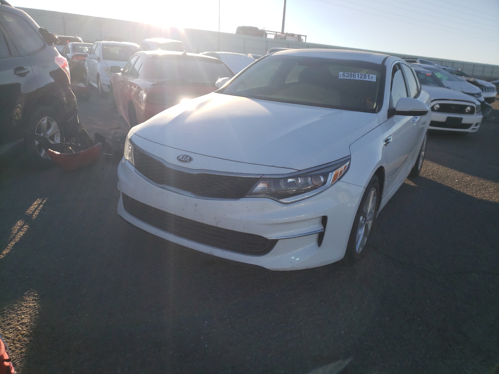 Photo 2 from auction – 2018 KIA OPTIMA LX with VIN 5XXGT4L32JG272522
