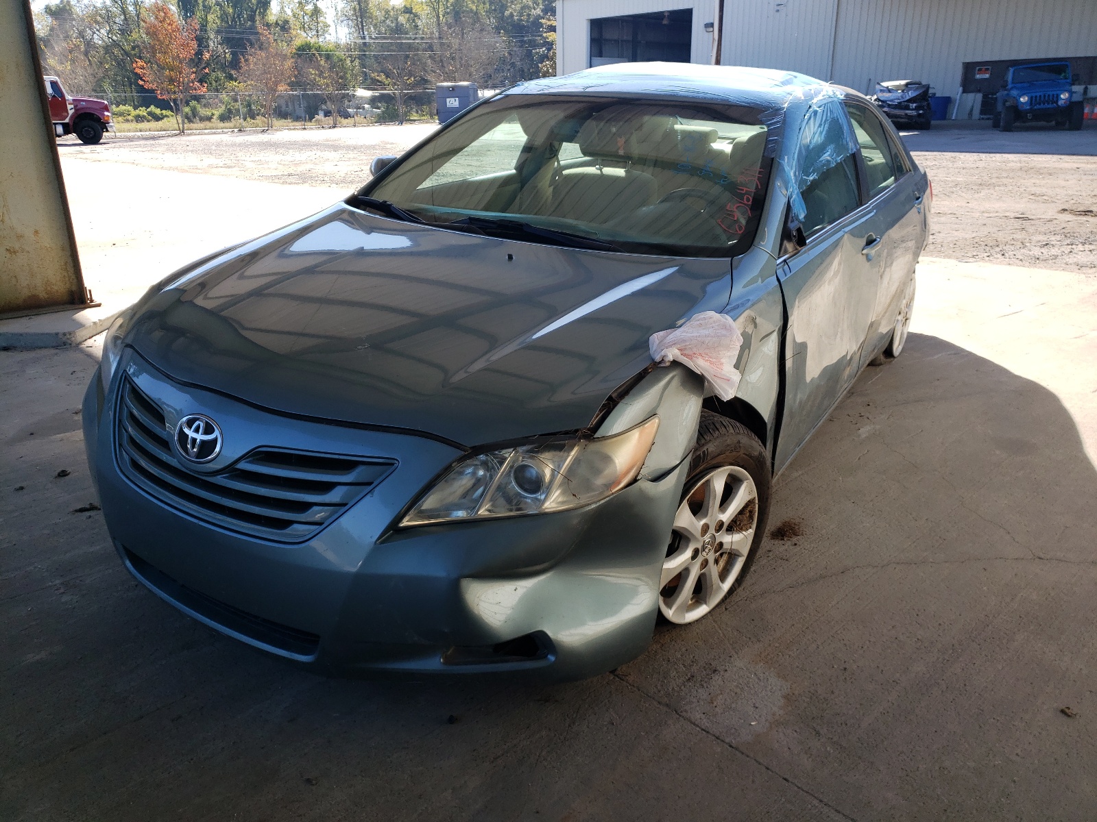 Photo 2 from auction – 2009 TOYOTA CAMRY BASE with VIN 4T1BE46K69U831255