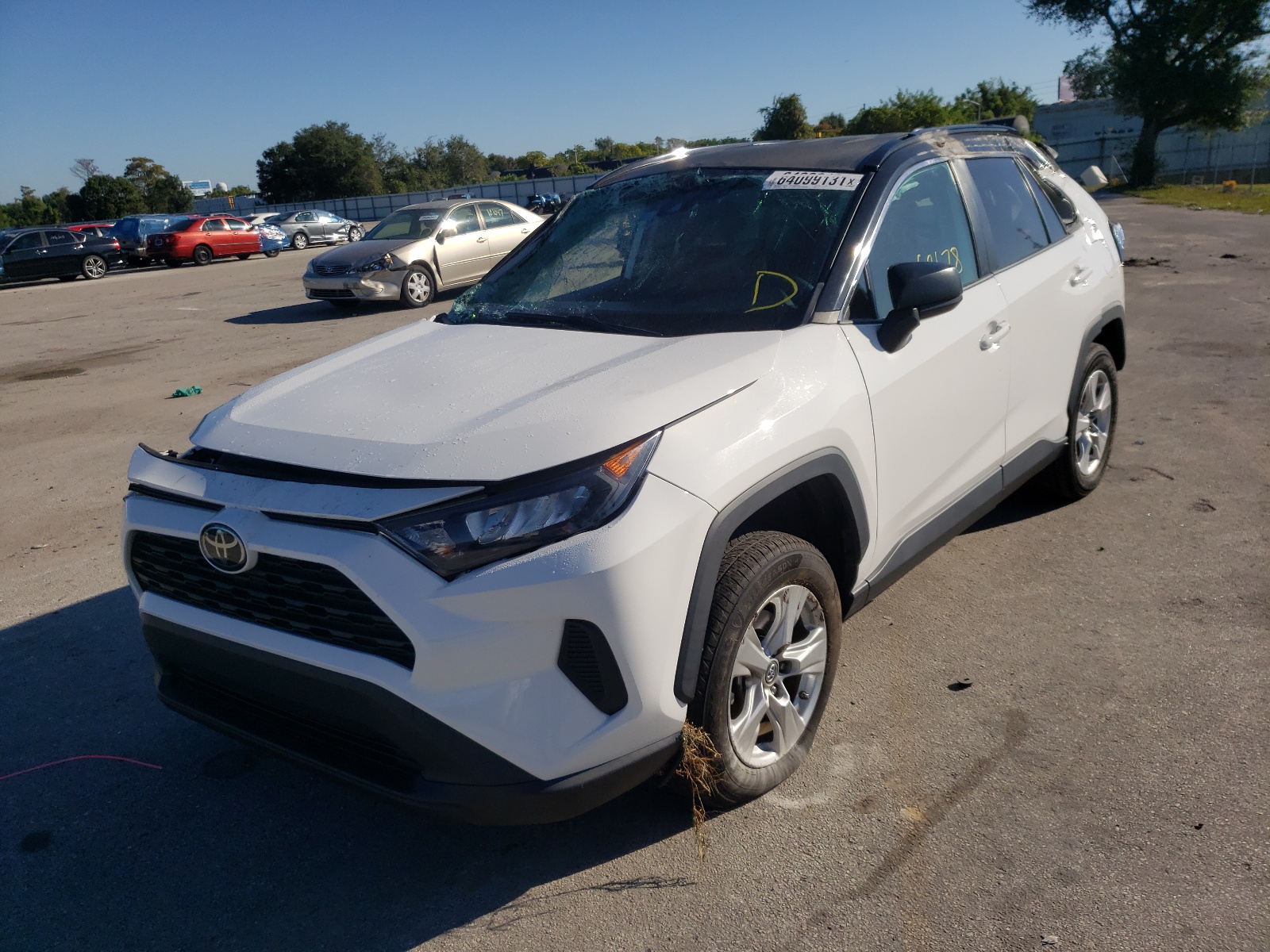 Photo 2 from auction – 2019 TOYOTA RAV4 LE with VIN 2T3H1RFV3KW017932