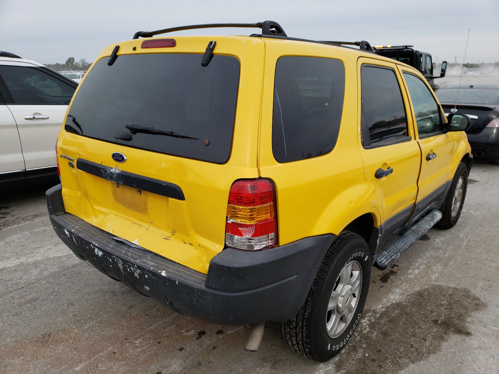 Photo 4 from auction – 2003 FORD ESCAPE XLT with VIN 1FMYU03103KA69321