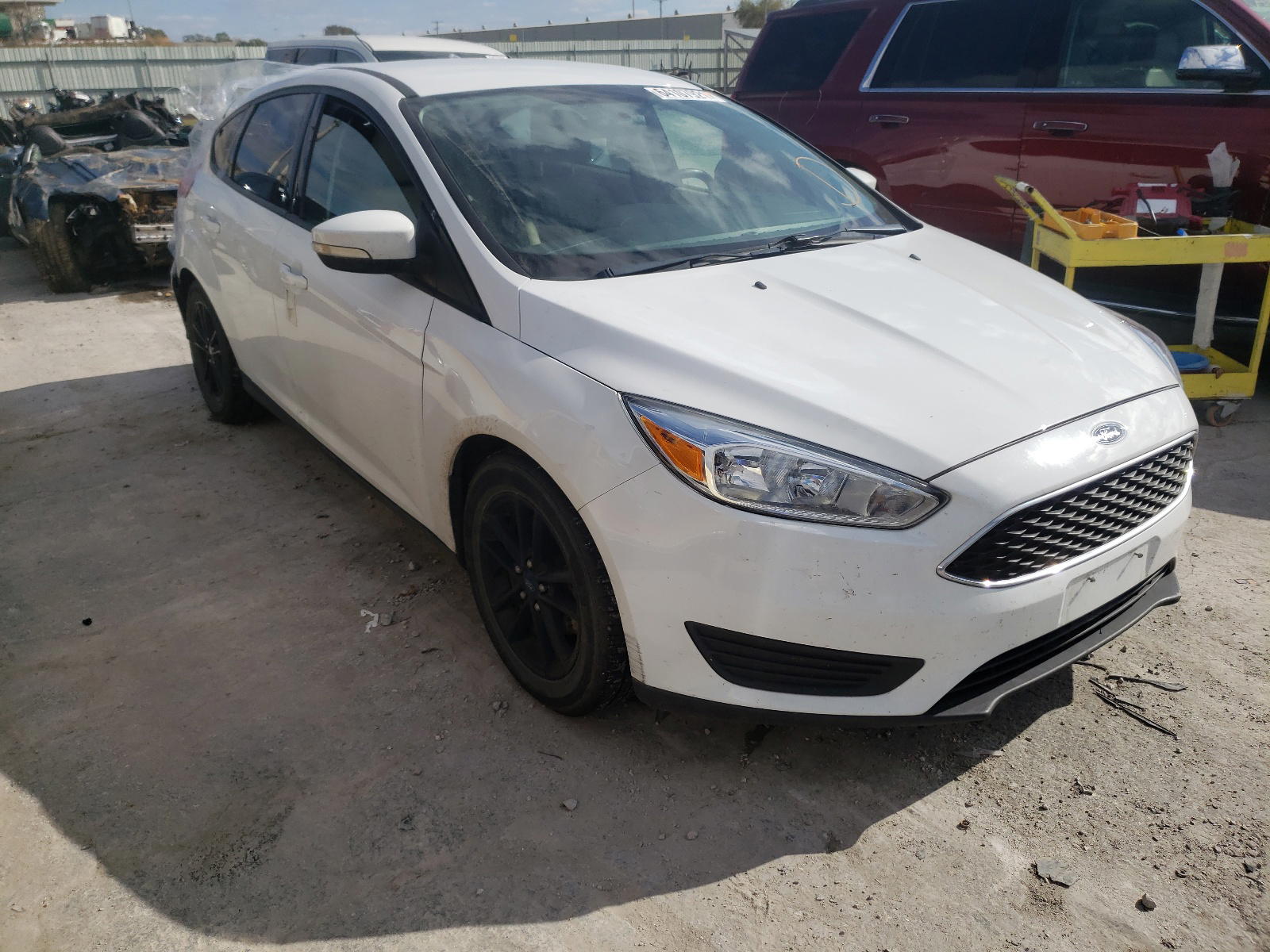 FORD FOCUS SE 2015 with VIN 1FADP3KE3FL281053 - Photo from auction
