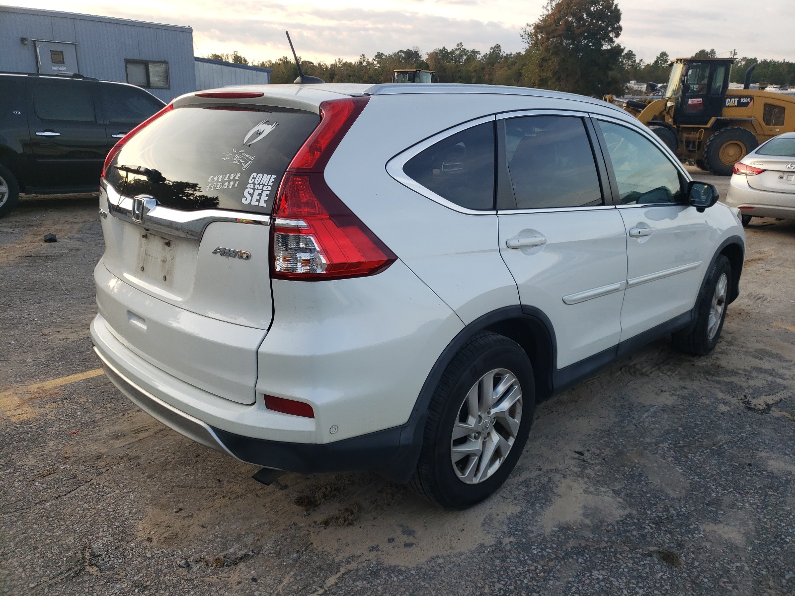 Photo 4 from auction – 2016 HONDA CR-V EXL with VIN 5J6RM4H70GL135258